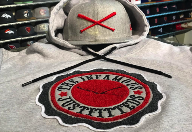 justfitteds-crossed-bats-logo-college-patch-hoodie